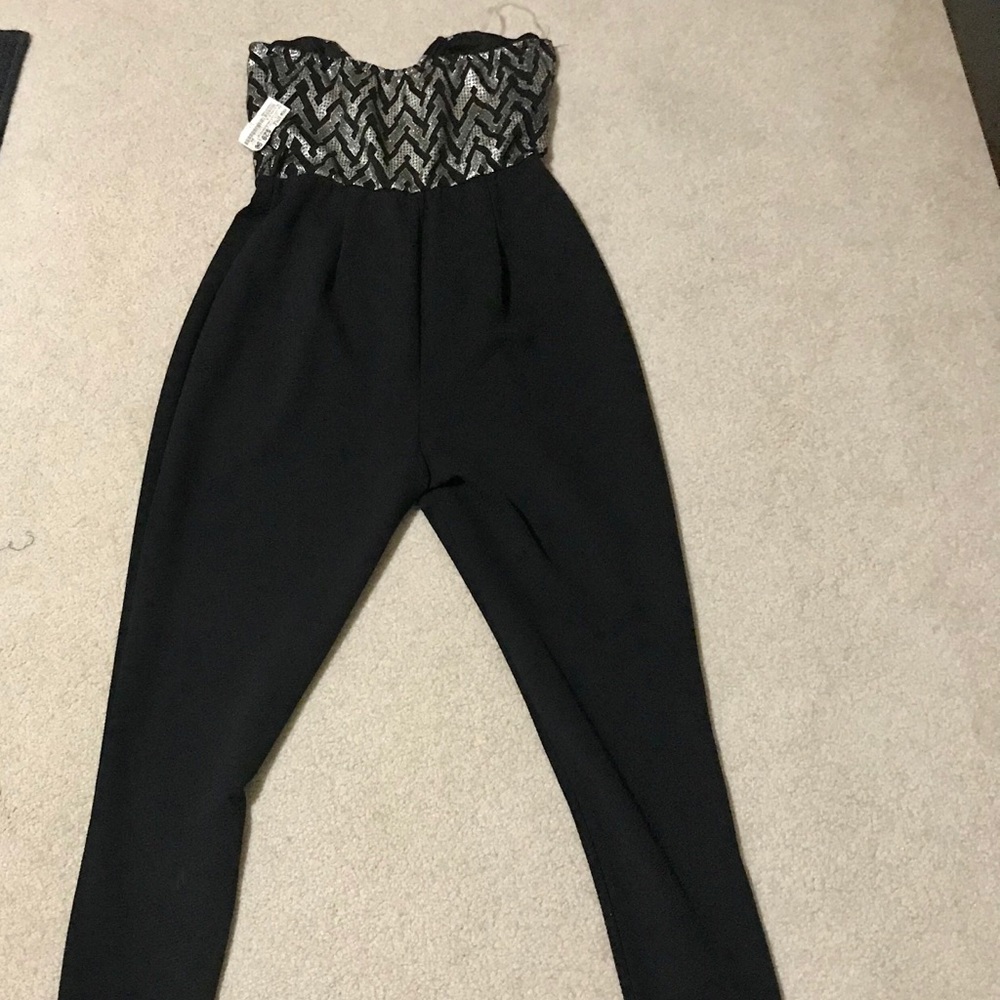 NWT Black and gold jumpsuit.